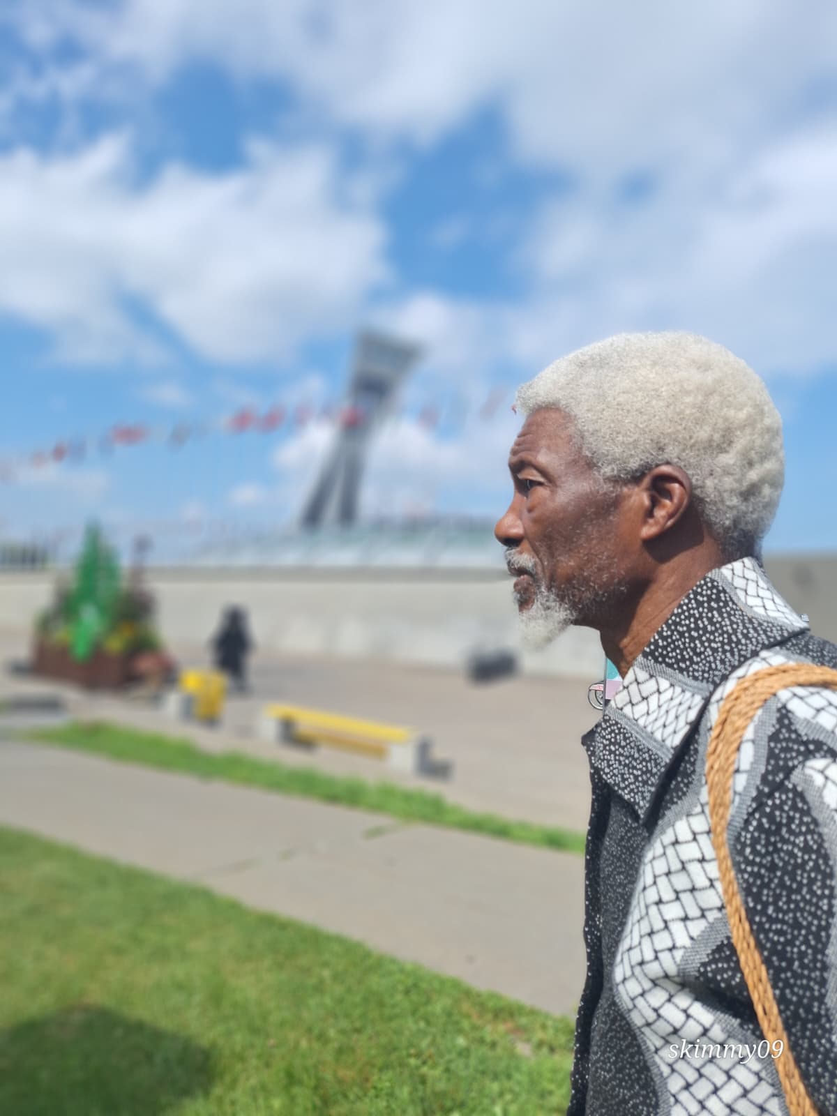 Pa Ndambi Paul Angemba on a street during family travel